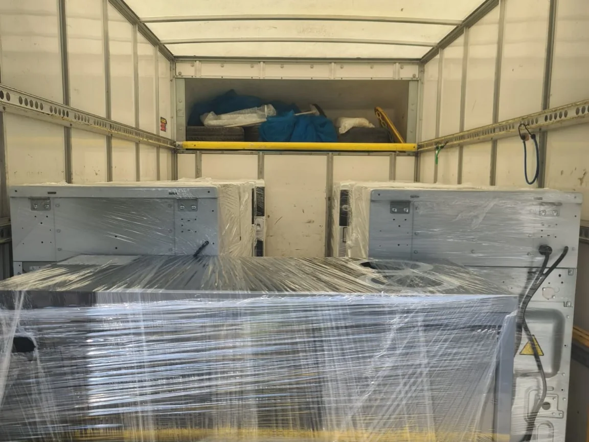 Large wrapped commercial load secured in a vehicle